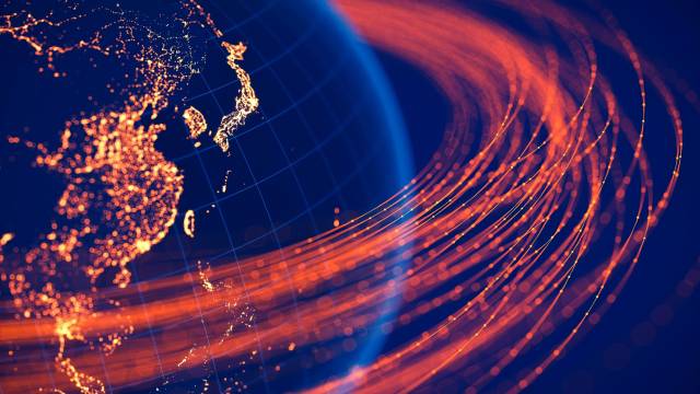 Orange streams of data flowing around planet Earth