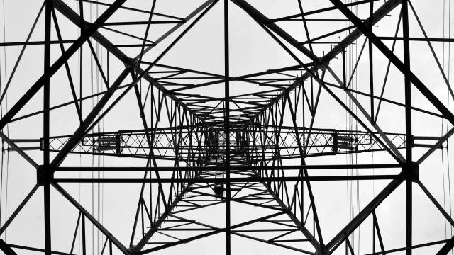 Abstract pattern of electricity pylon photographed from below